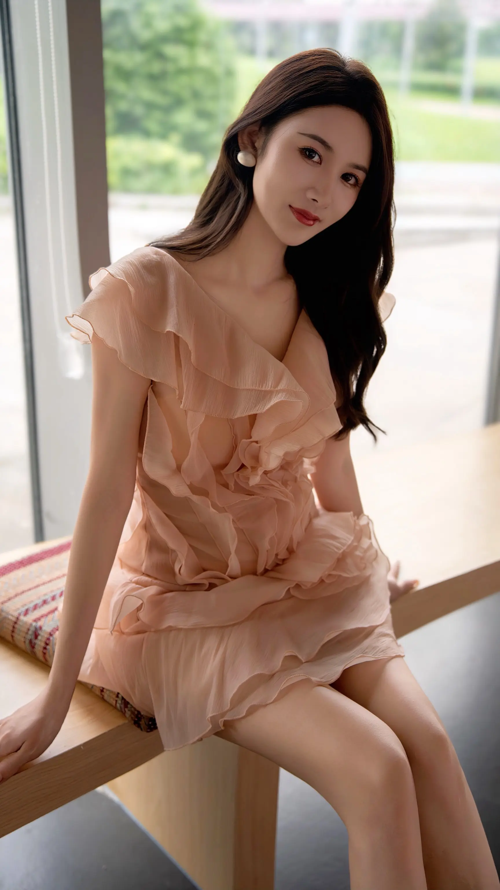 她真的很温柔，声音也很温柔，笑起来也很温柔