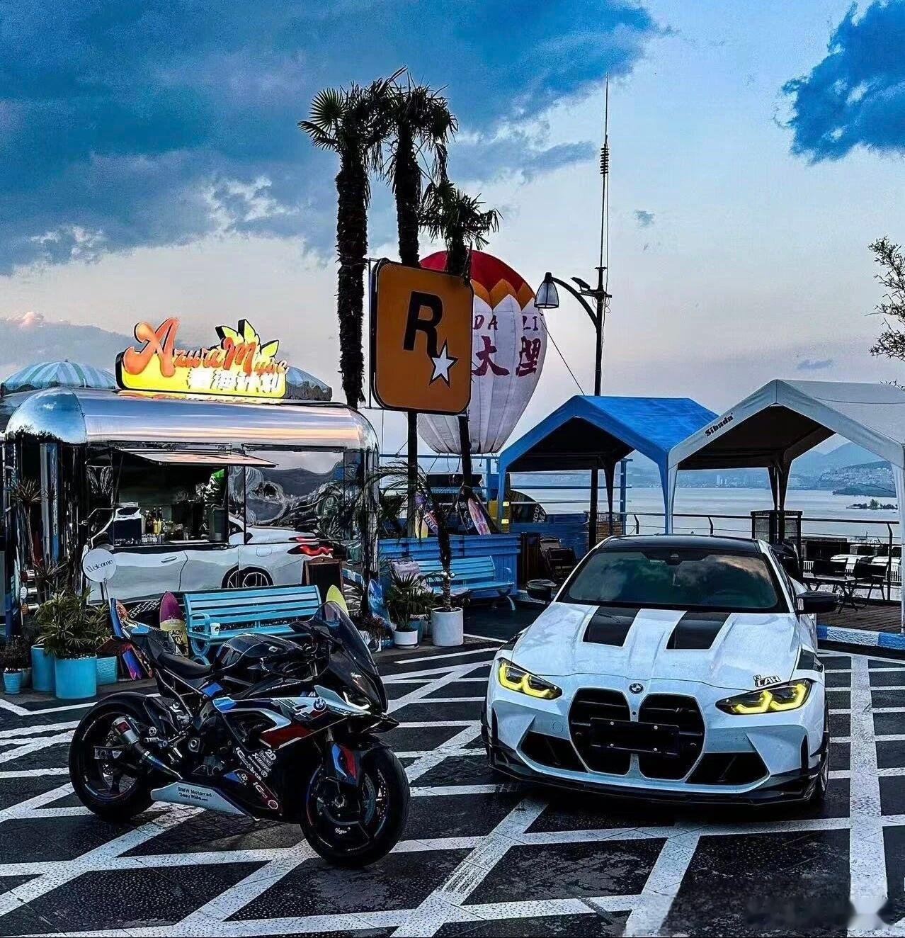 双王炸裂公路 两轮猛兽M1000RR与四轮战神M4同框，血脉贲张的性能在此并肩。