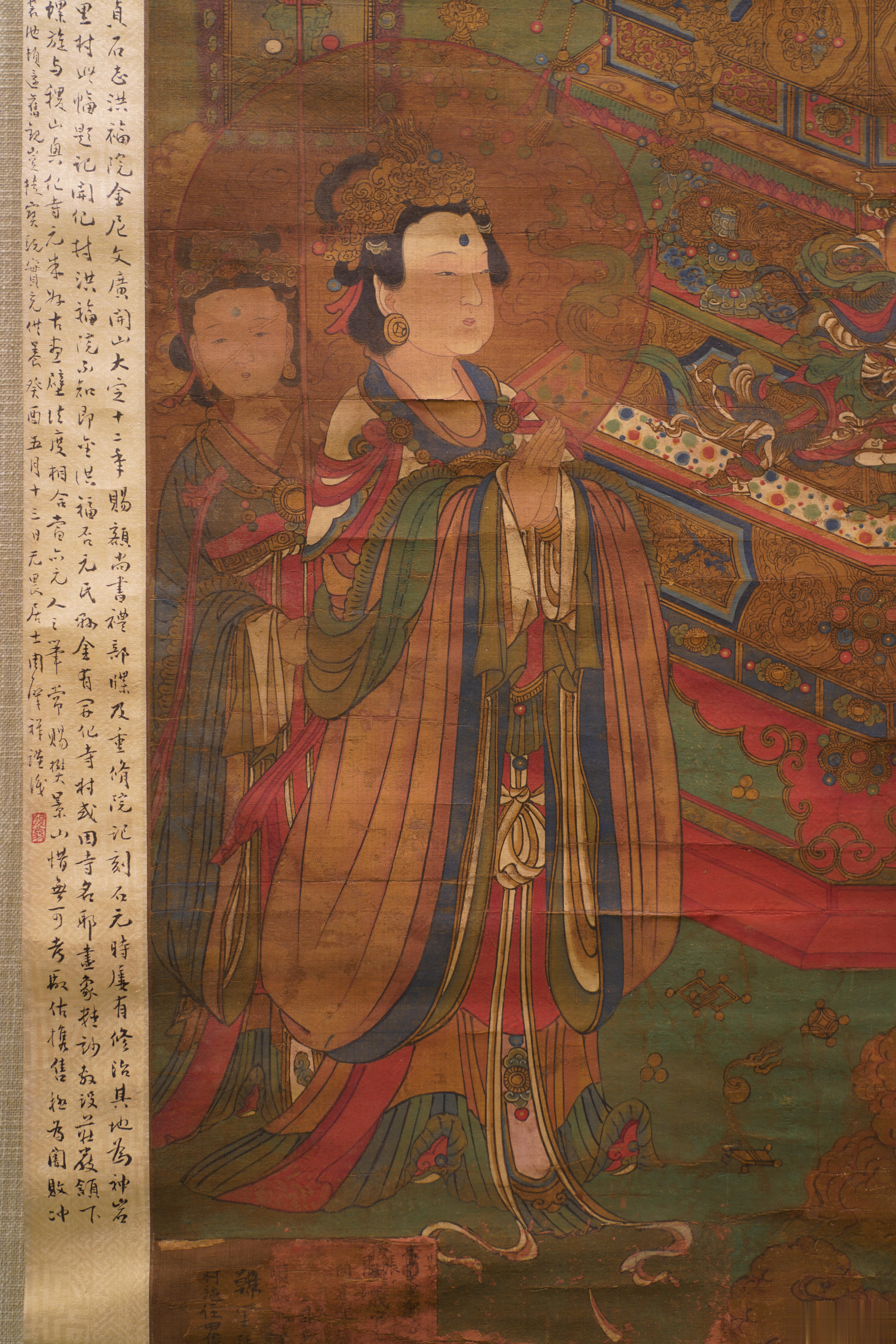 首都博物馆画中三千界特展毗卢遮那佛像明代早期绘制的作品，风格样式与元代寺院壁画十