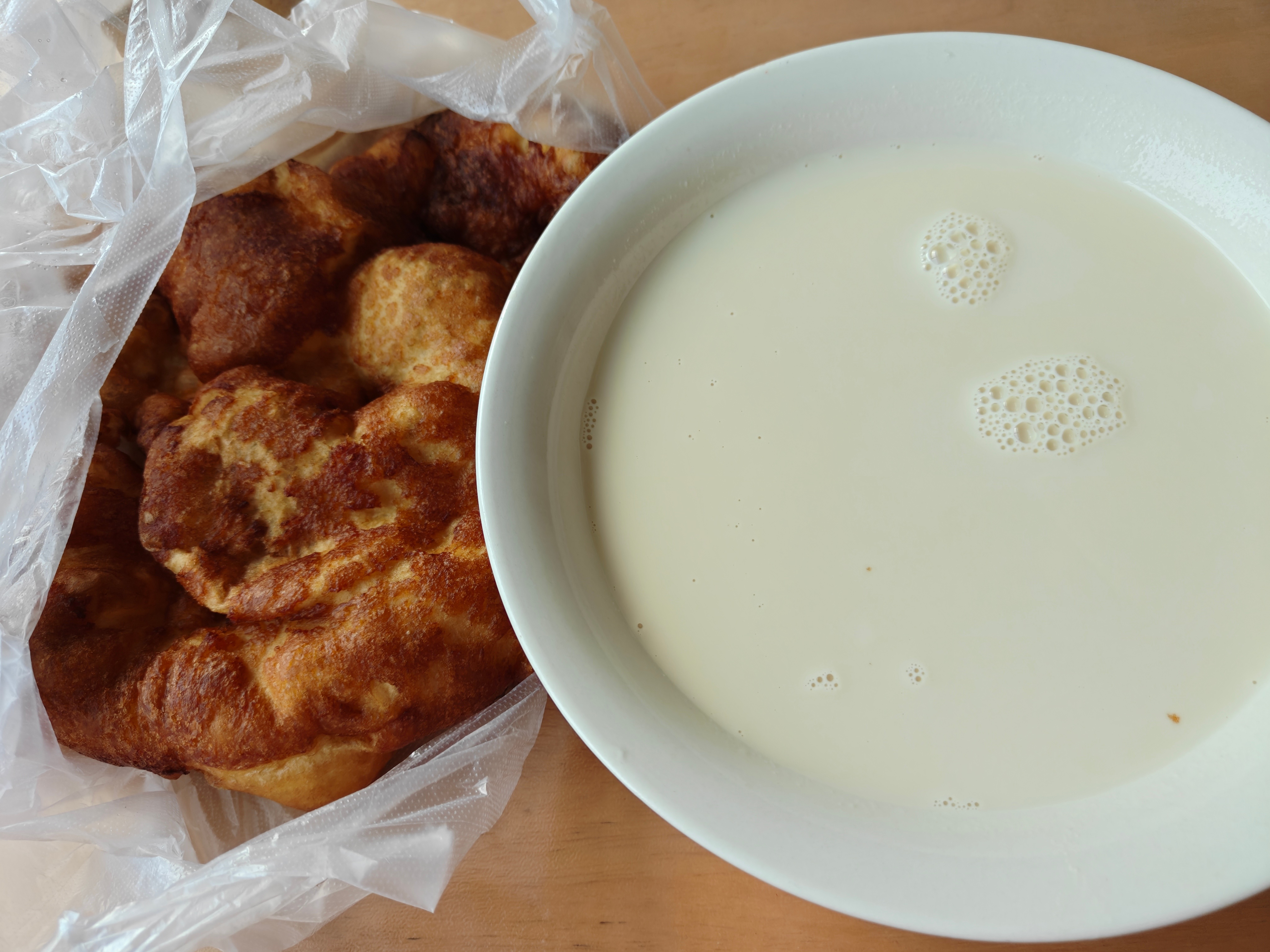 整个北方地道早餐纯豆磨的豆浆就是好喝知道图二是啥不？ ​​​