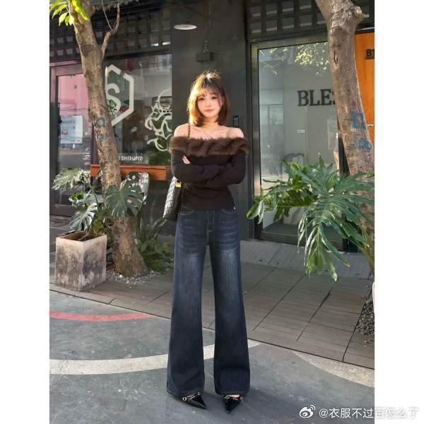 【裤子】巨好看的一条深蓝色牛仔裤，版型微喇，面料有一点弹性。裤子版型和商品图差不