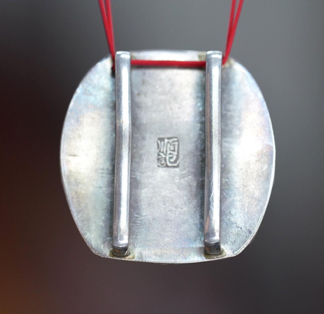 自己玩的带扣，好多年前再内蒙古二连浩特淘的。