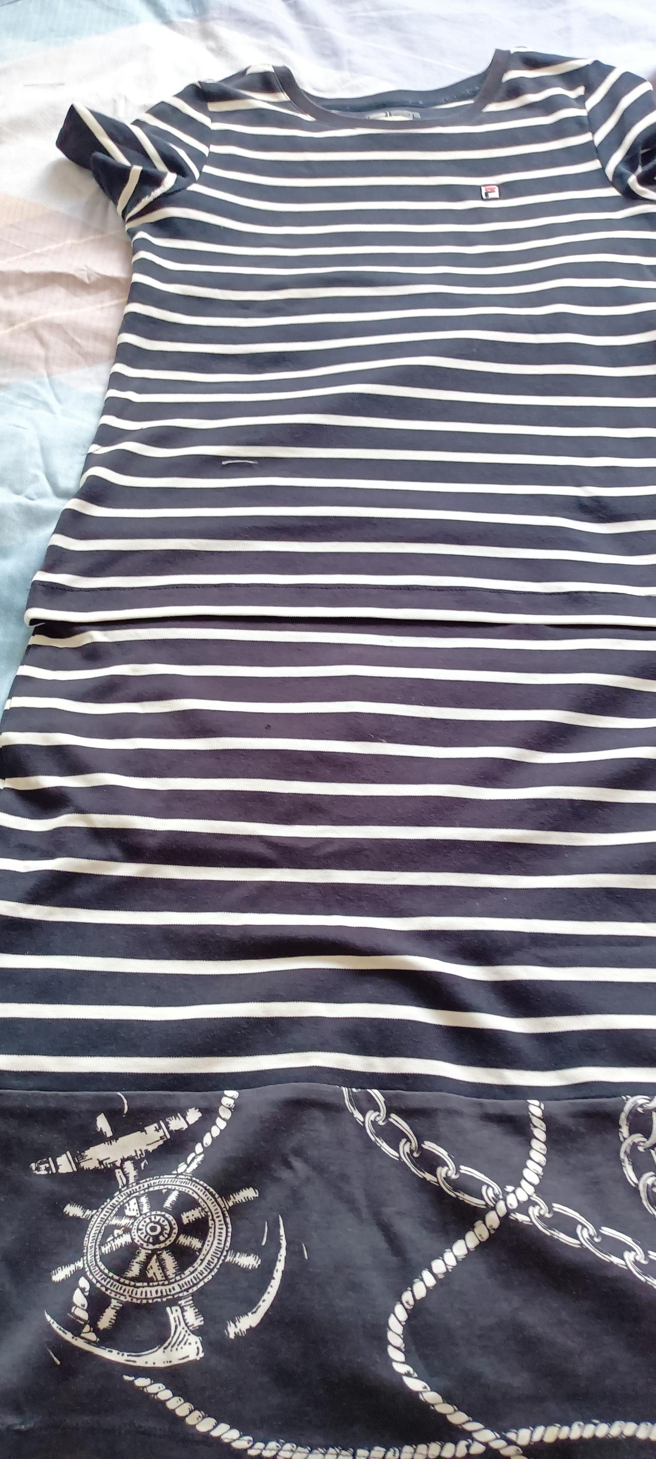 我今天拥有了一件独一无二的衣服，再有钱也买不来，哪个专卖店都没有。
我有一件fe