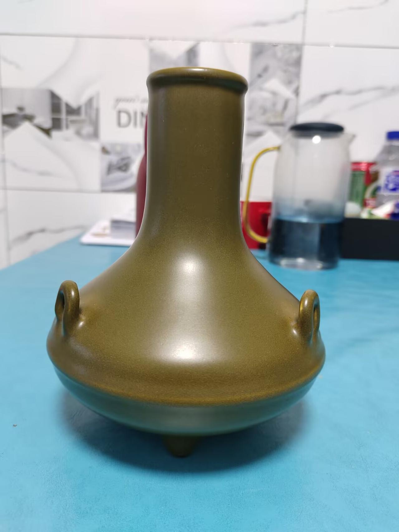 乾隆长的到底像不像他爹雍正，遗传密码大PK:乾隆茶叶沫釉荸荠瓶和清雍正粉青釉荸荠