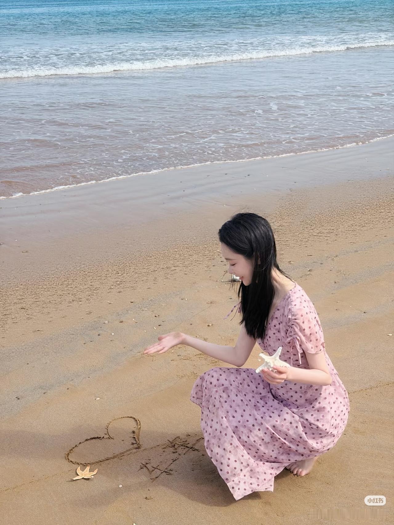 沙滩上写的啥字？