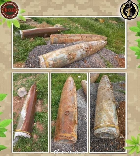 伊朗人清理未爆炸的美国航空炸弹。 