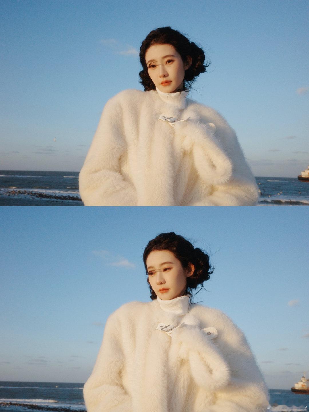 张艺凡咋萌成萨摩耶了 张艺凡秒变萨摩耶既视感！冬日海边，奶白小团子造型，双揪揪俏