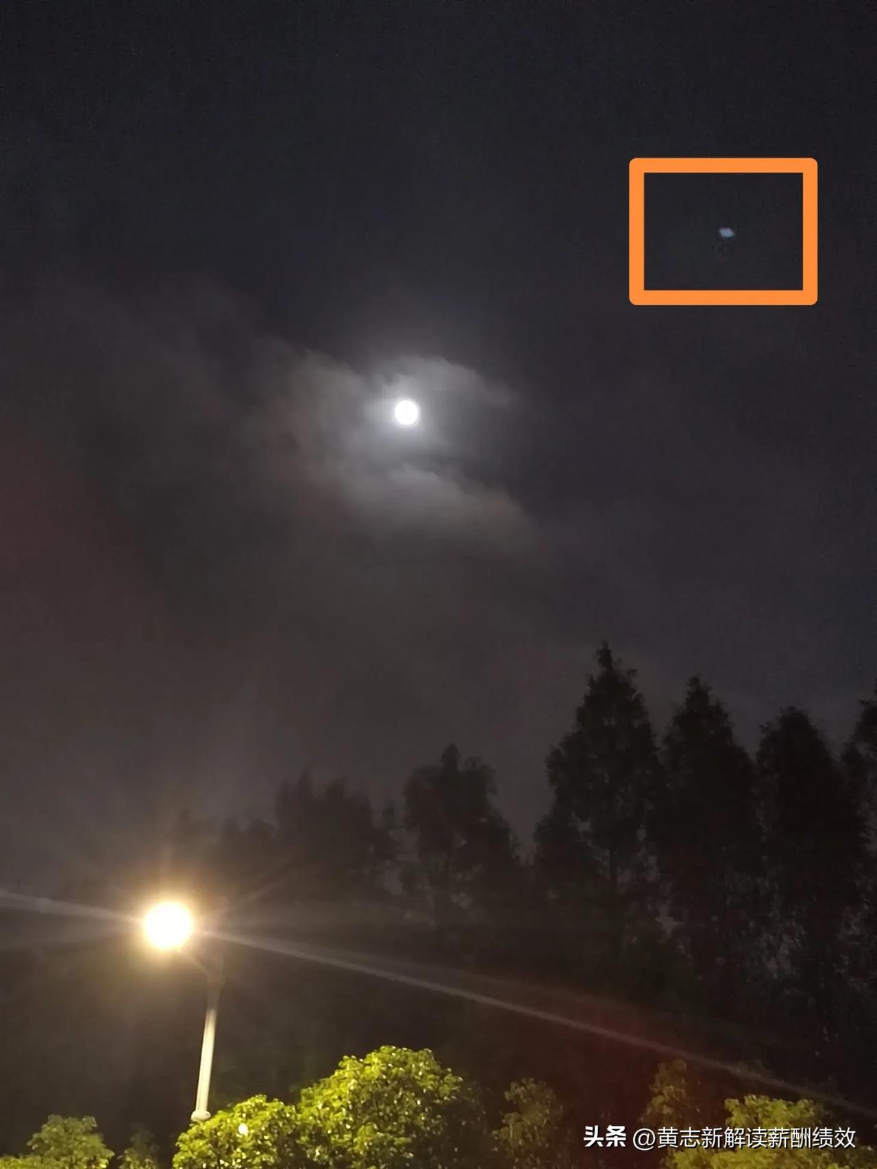 上海月亮很美，但拍到了一个光点，不知何物？