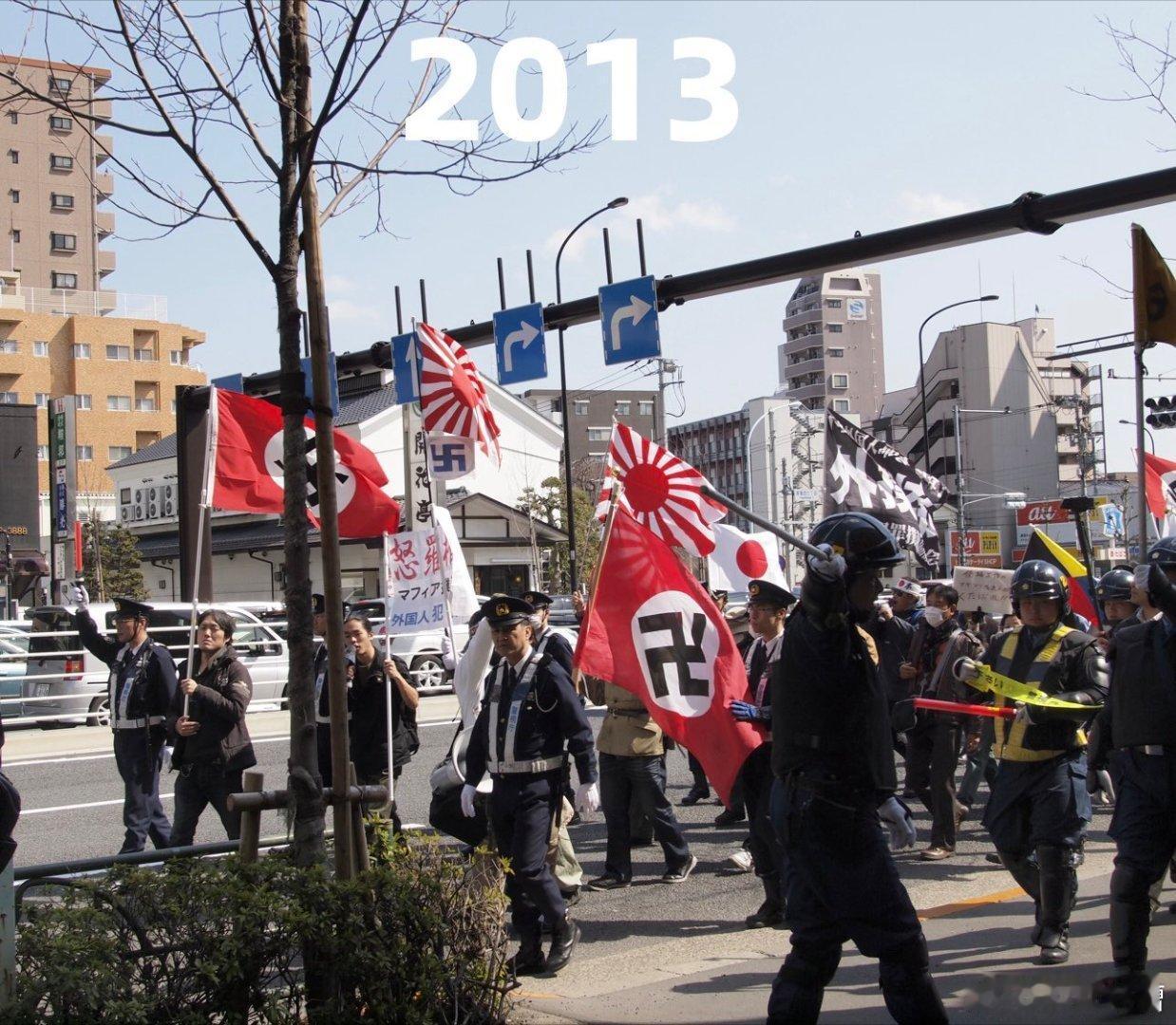 在日本街头，纳粹旗和日本军旗同时出现在街头，是很多年的事了，邪恶的军国主义一直在