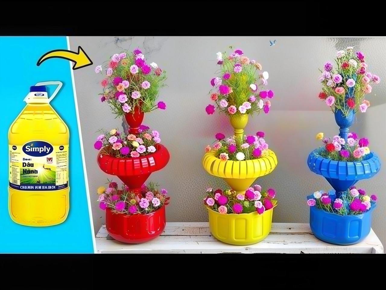 旧物巧做三层花塔，废品也有大浪漫🌼大油桶做底层花盆，中间一根水管当支柱，最顶