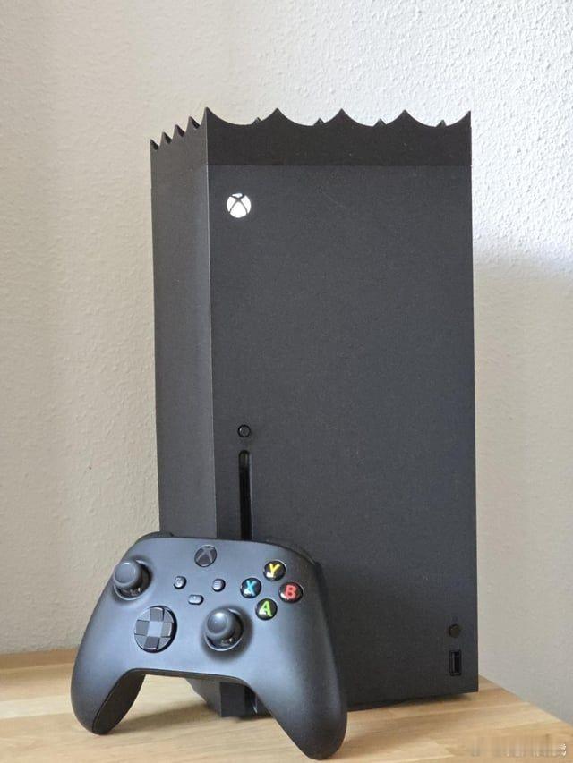 猫总坐在主机散热孔怎么办这就是养猫玩家的终极难题：你买的是 Xbox。猫看见的是