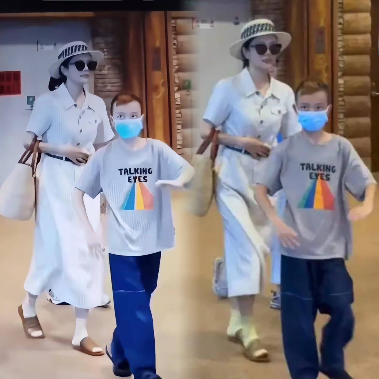 汪涵的老婆杨乐乐带孩子外出，可身边的孩子真的越看越奇怪，
行为举止都不像是正常的