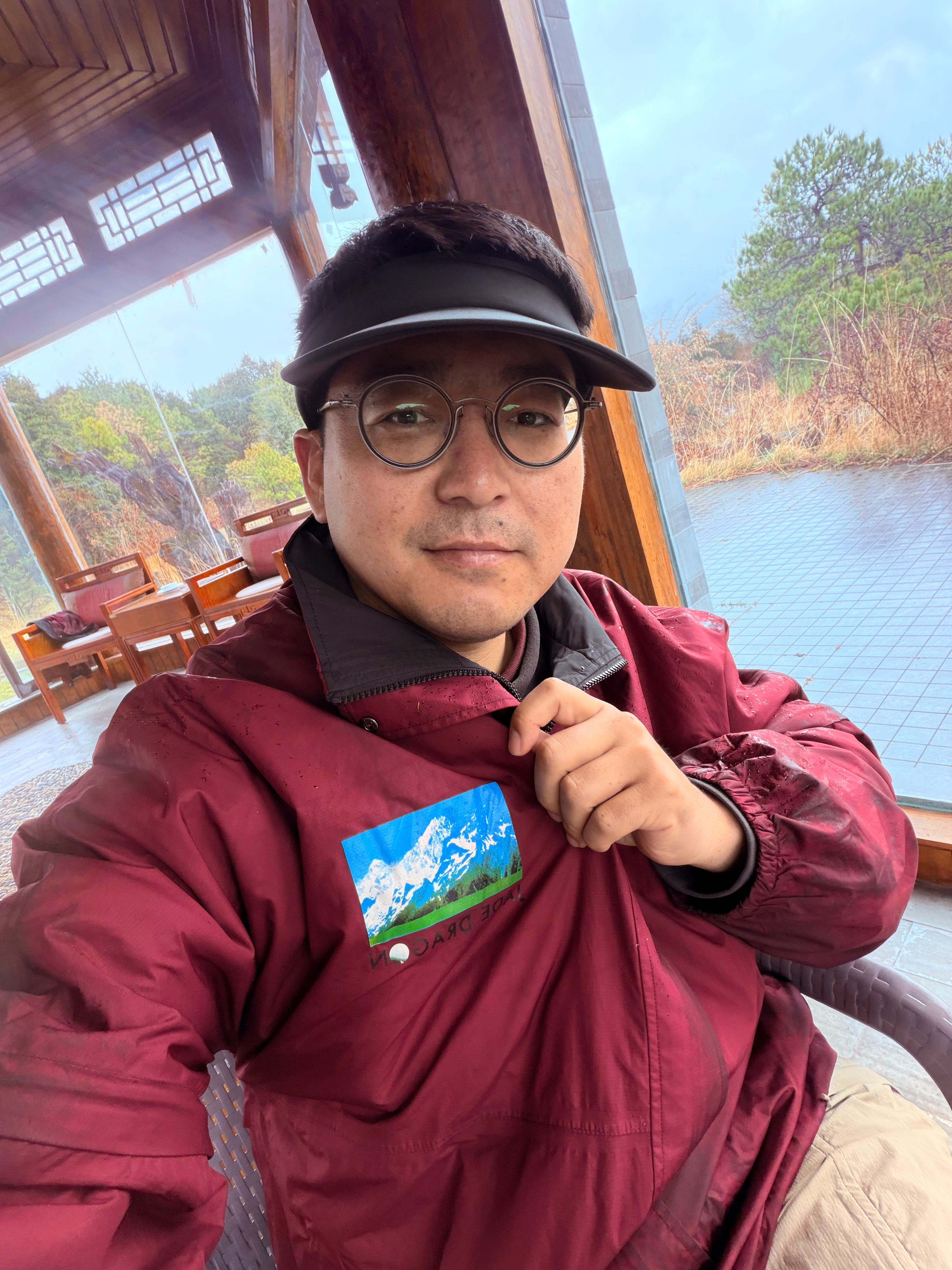 没苦硬吃还得花钱吃顶着雨打卡吉尼斯记录球场 丽江·丽江玉龙雪山高尔夫球会