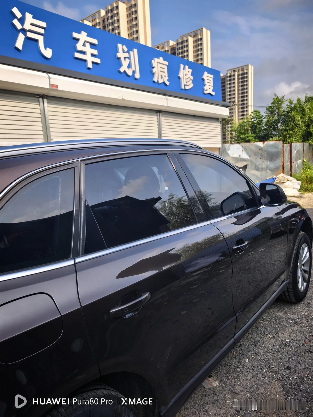 今天花了850元，采用凹陷修复技术修好了右前门划痕和喷漆，修完后从外观效果看非常