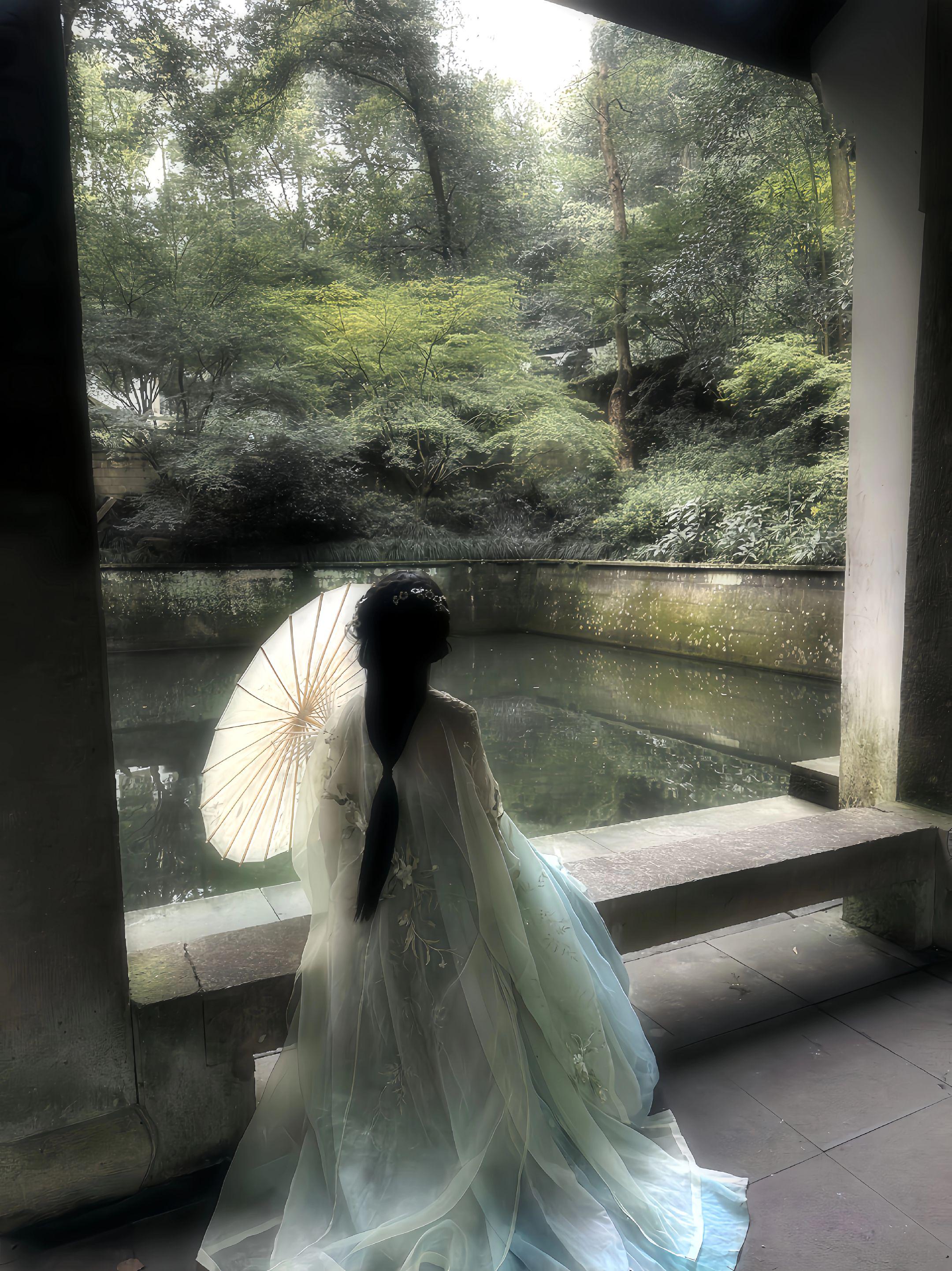 “青纱似春烟渺渺”