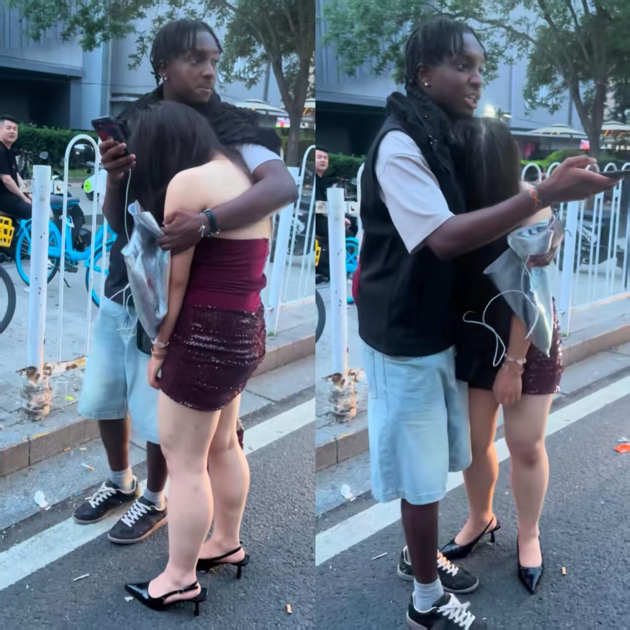 街头看到一对男女，路人纷纷觉得挺不是滋味。天还没黑，女生已经醉意朦胧，靠在黑人男