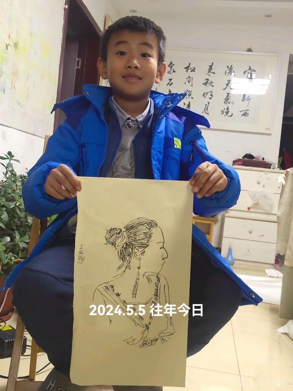 爱画画的小孩长大了