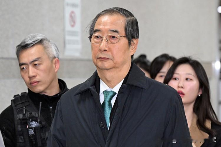 1月26日韩国前国务总理韩德洙方面与内乱特别检察组均不服法院对韩23年有期徒刑的