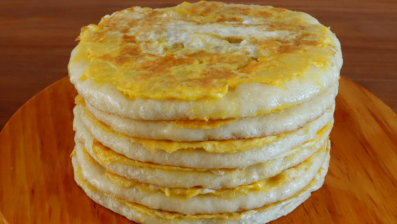 家庭版土家夹菜烧饼（宣软蓬松版）
这是一款不用烤箱、平底锅就能做的软饼，夹菜夹肉