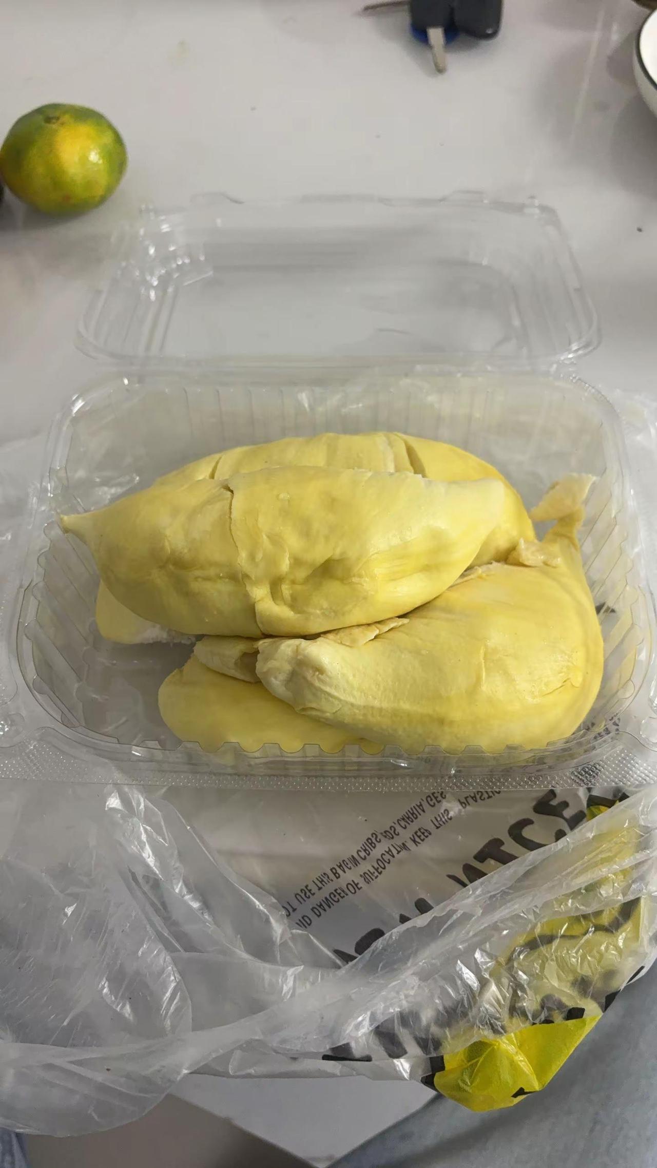 你就说9.9的榴莲怎么样吧，老板娘说一车也挑不出你这个干包还出肉这么多的！总价3