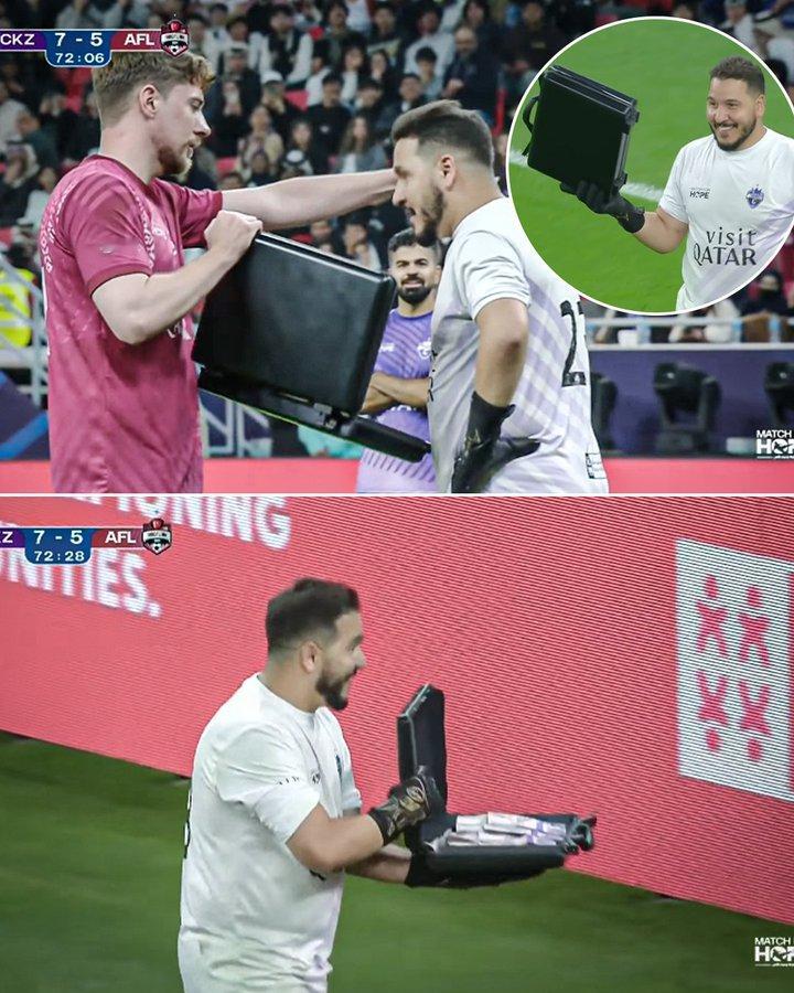 在“希望之战”慈善赛中，MrBeast 拿出了一箱子钱贿赂守门员，让他罚进点球。