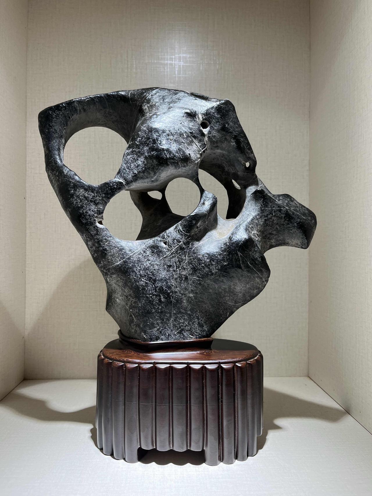 来宾考洞石[心]