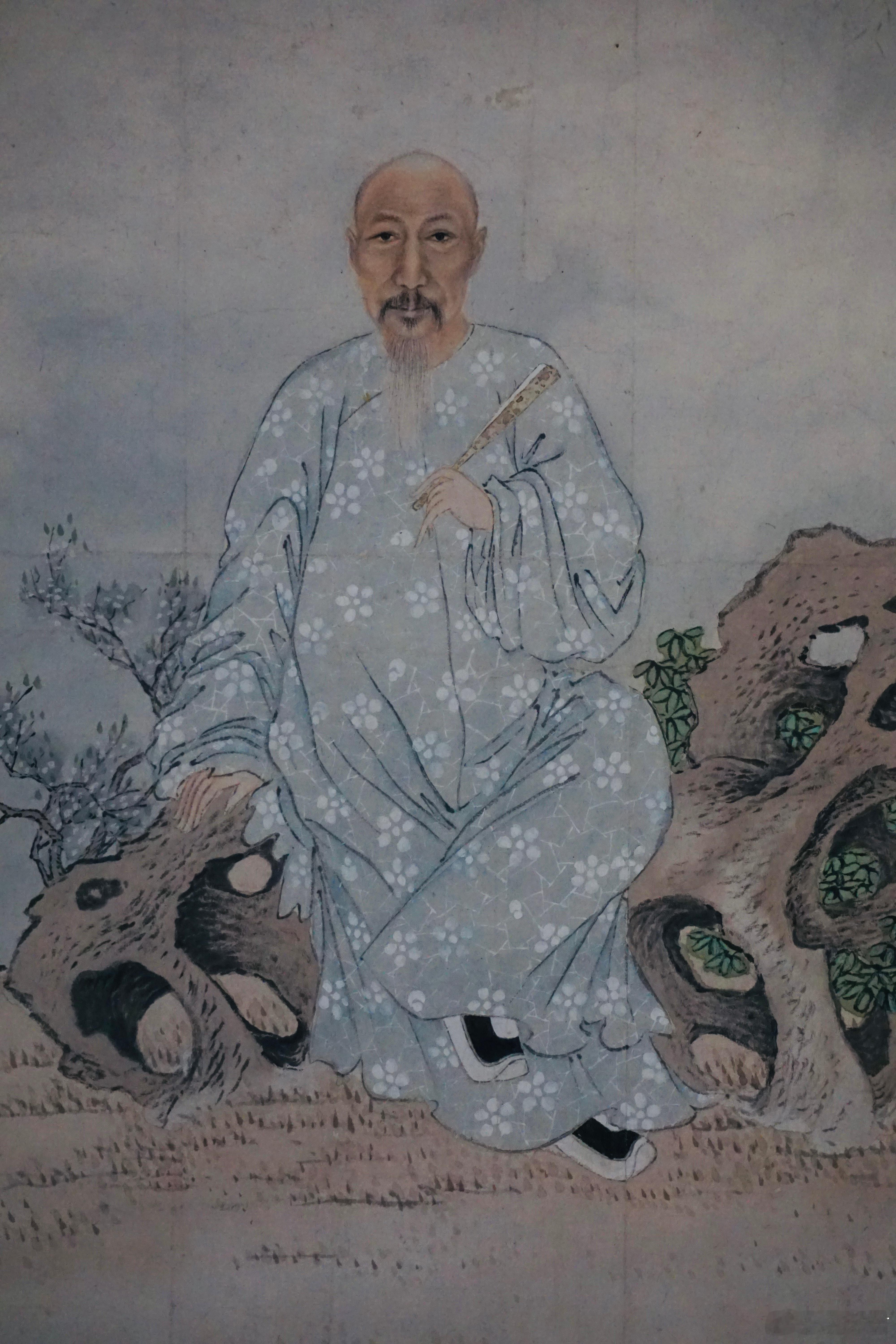 着冰裂梅花纹袍子的袁枚 ​​​