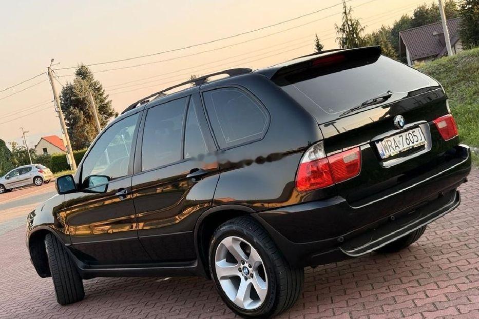 2005年宝马X5，这是乌克兰的二手车，跑了28万多公里，3.0柴油机，要价22