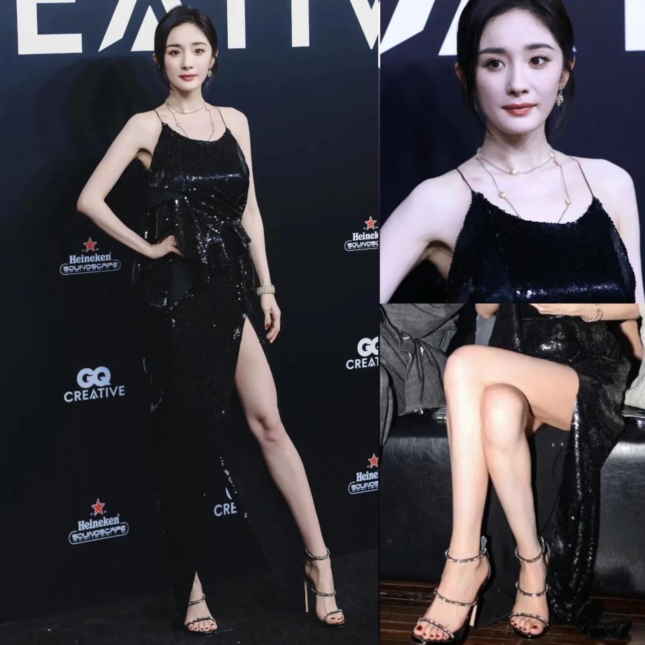 杨幂
一袭黑色亮片吊带开叉裙亮相
别人穿黑裙是低调，她穿黑裙是“姐就是女王”的嚣