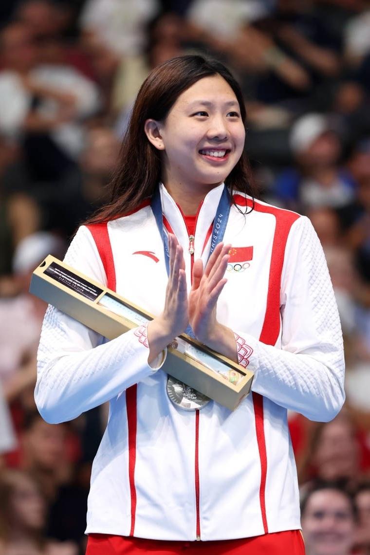 大家有没发现，国家游泳运动员唐钱婷和举重运动员李惠珍长得有点像，像姐妹俩