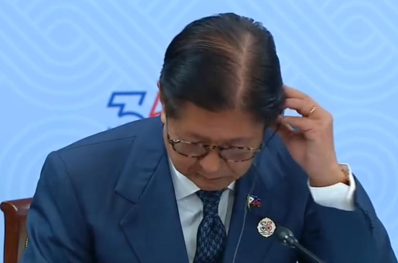 俄罗斯-东盟峰会现场突发小插曲！普京用英语当众提醒菲律宾总统马科斯没戴传译耳机，
