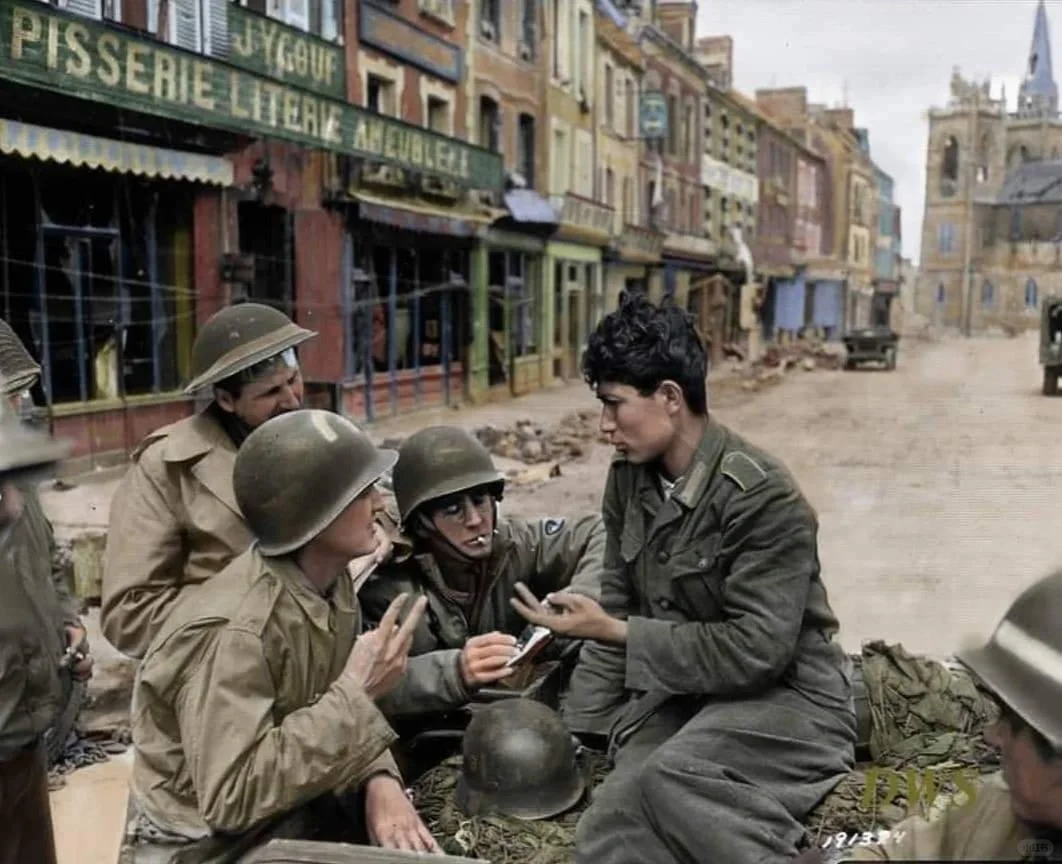 1944年7月9日，德国国防军部队中的一名东方裔士兵告诉几名美军，他在...