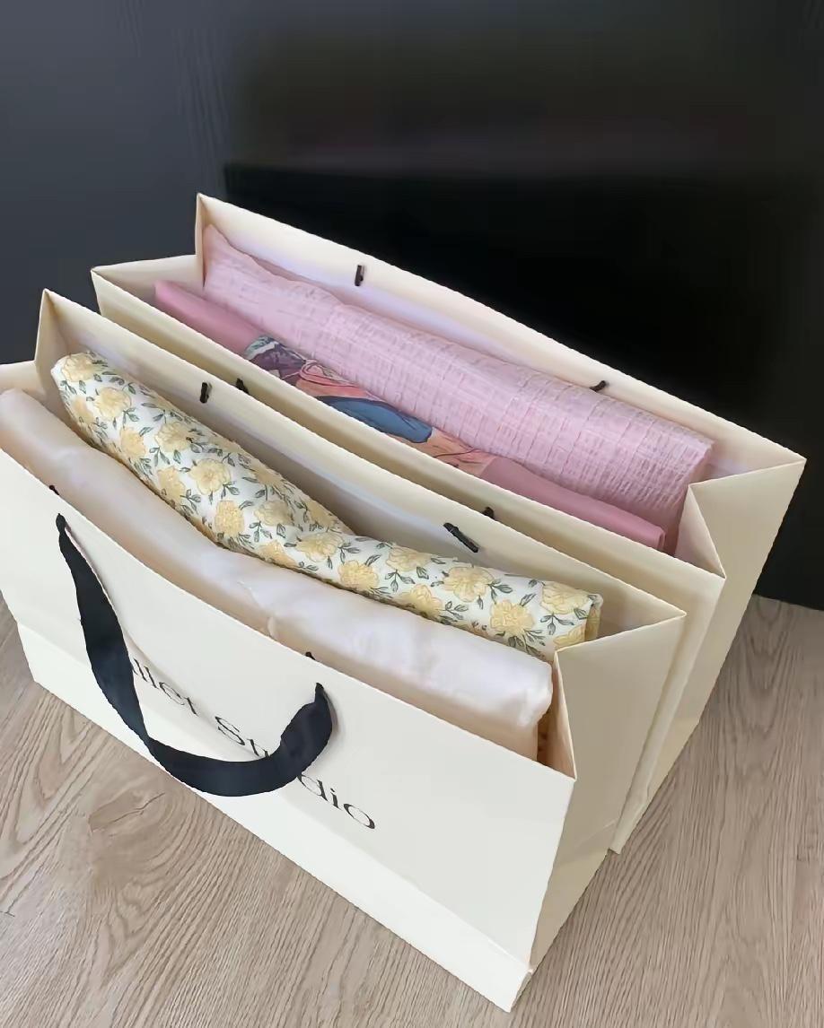 闺蜜送了三卷布料，粉色白色黄花图案，摸着像纯棉纱布。我想给孩子做几件夏天小裙子。