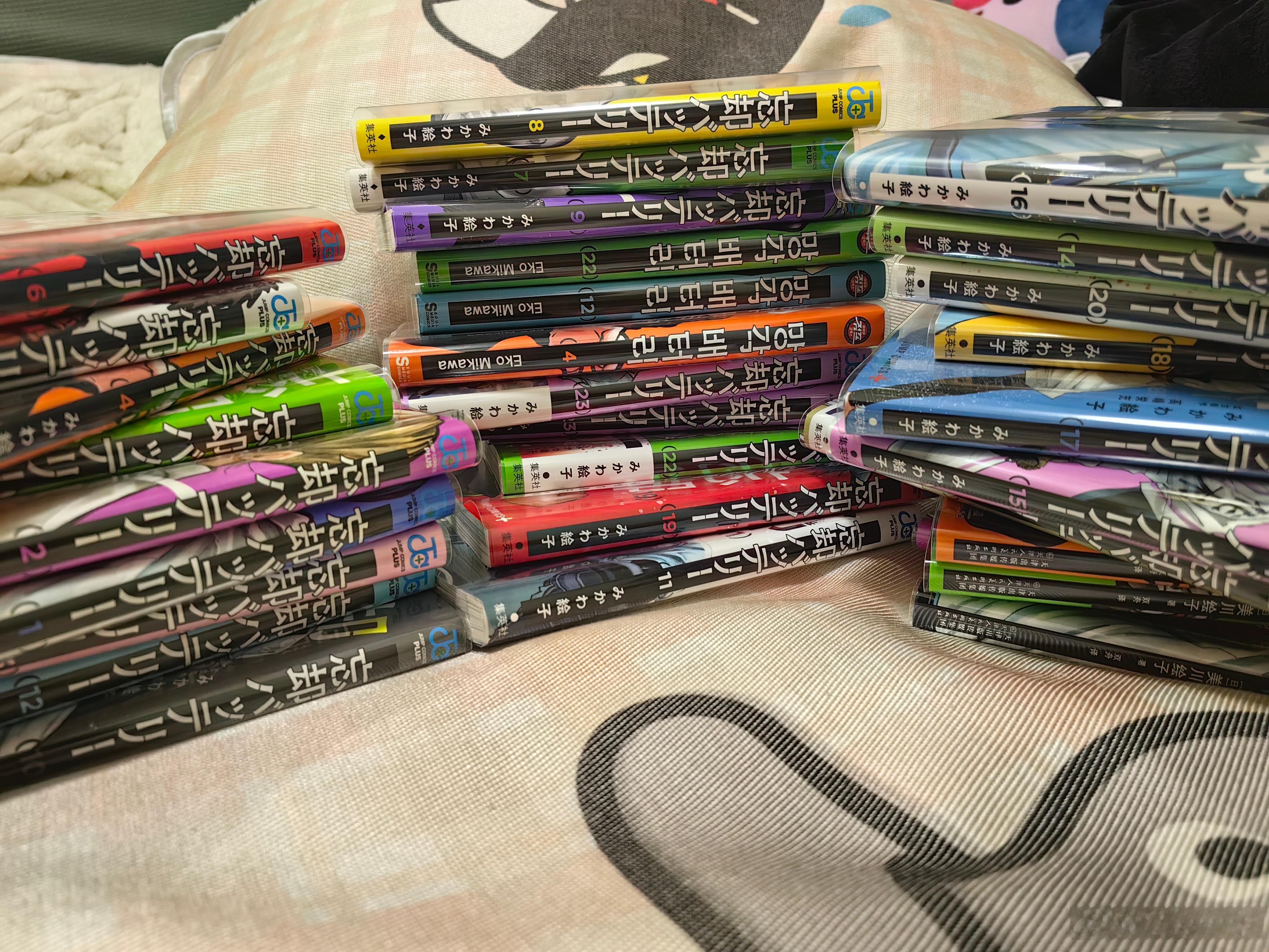 想保护一下漫画买了40个书皮。什么叫我忘八买了34本……差点不够用然后24卷继续
