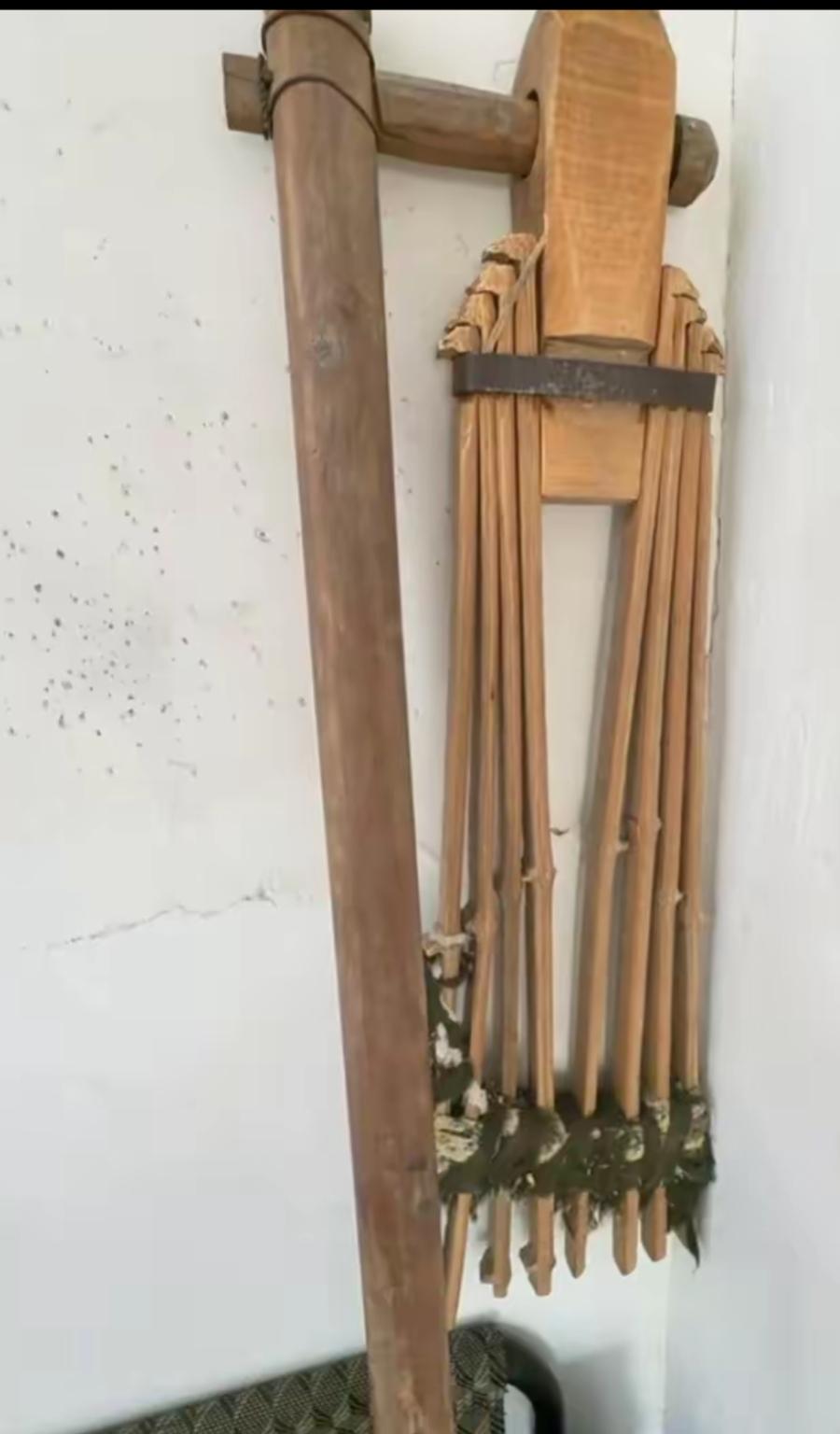 古琴悠扬，竹笛清脆。一个古老的东西好像用木头做的，这是干什么用的？有人知道吗？古