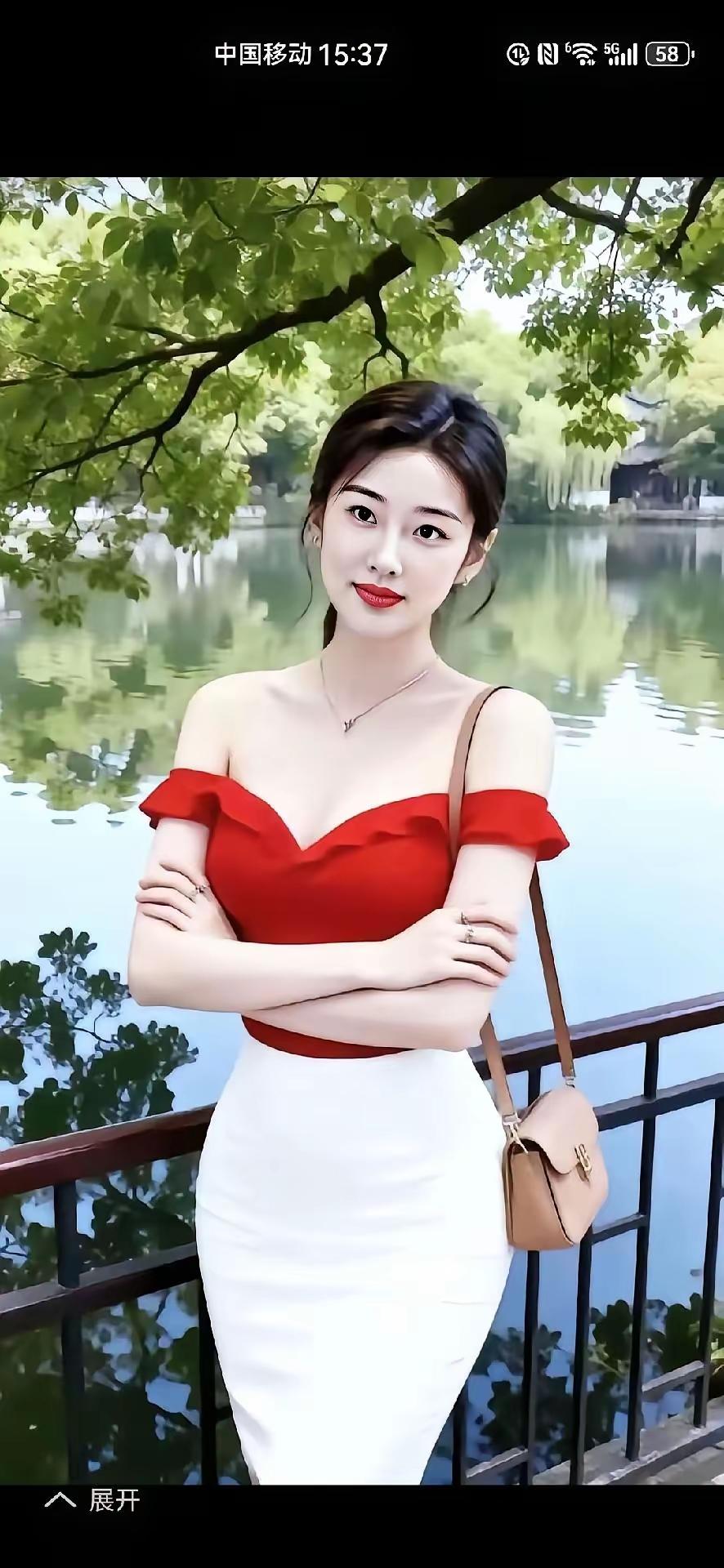 一个穿红裙子的女孩站在湖边。