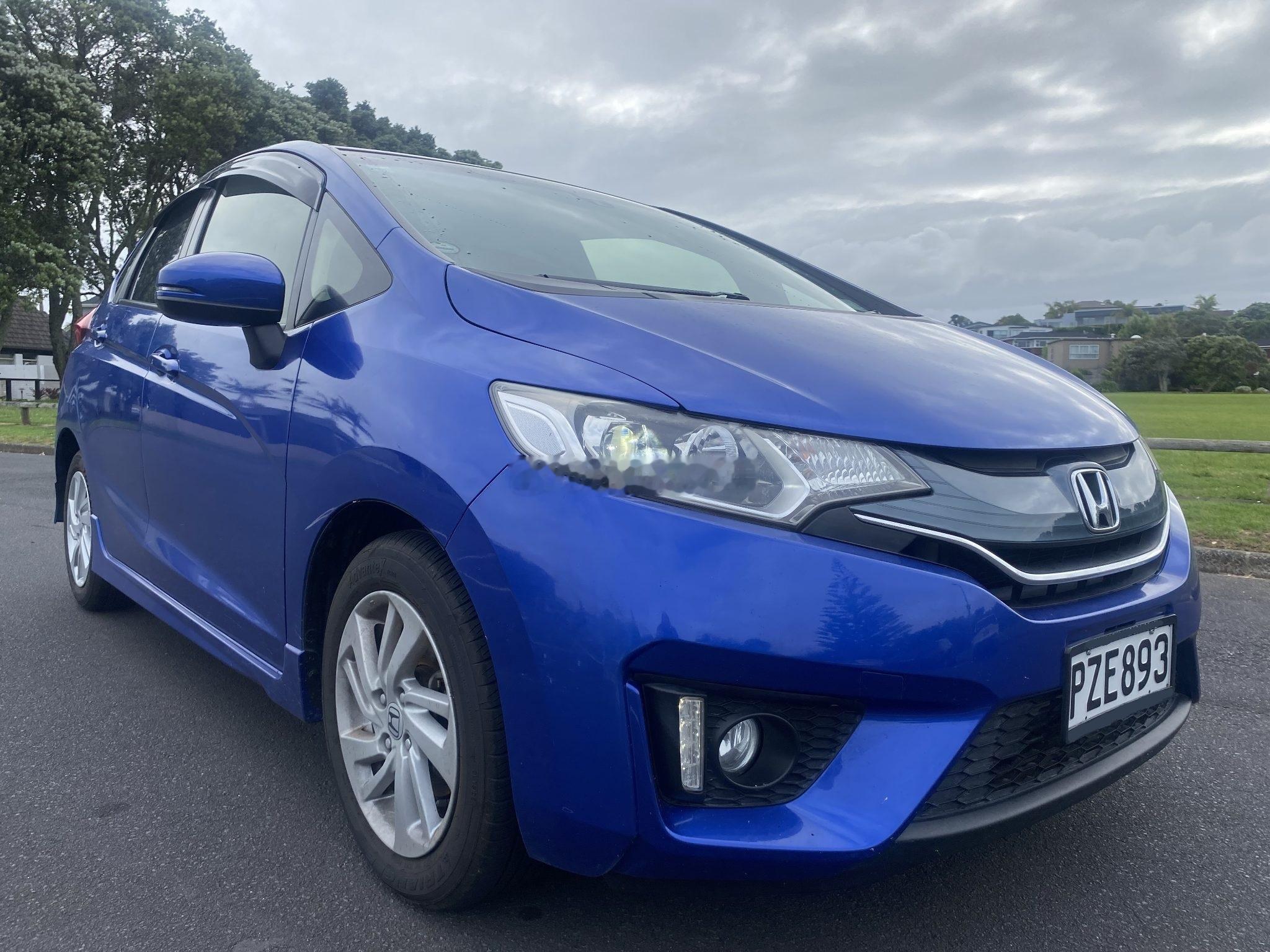 新西兰版飞度1.3自动挡，2014年在新西兰上的牌，跑了11.5万公里，车况没介