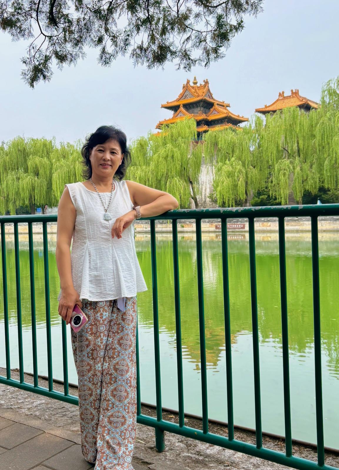 故宫角楼边留下一份永久的纪念