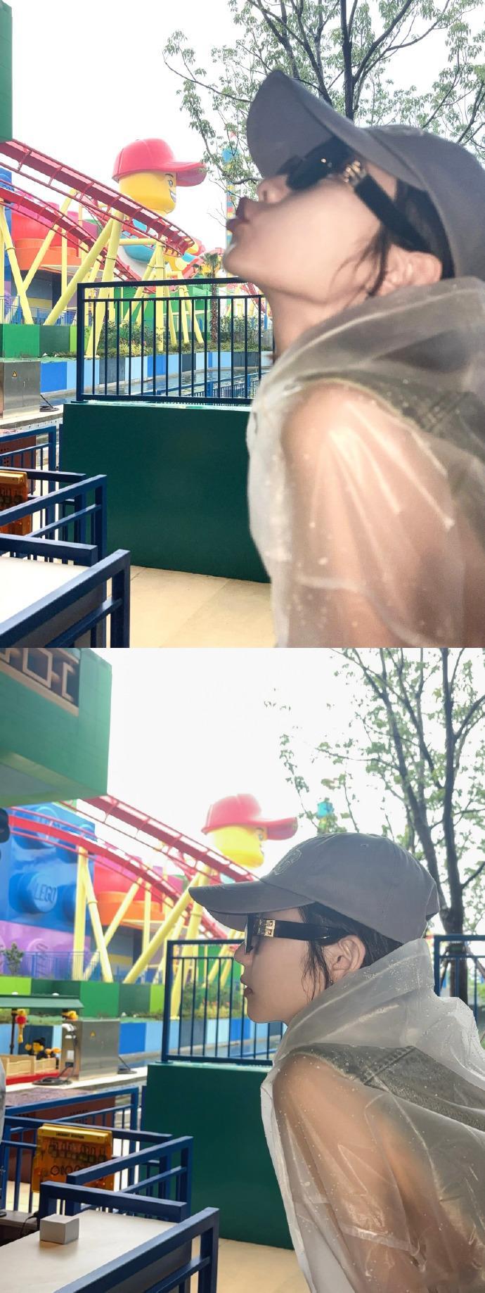 张艺凡雨中游乐园的快乐谁懂 张艺凡透明雨衣时尚感拉满谁被张艺凡雨天游乐园状态治愈