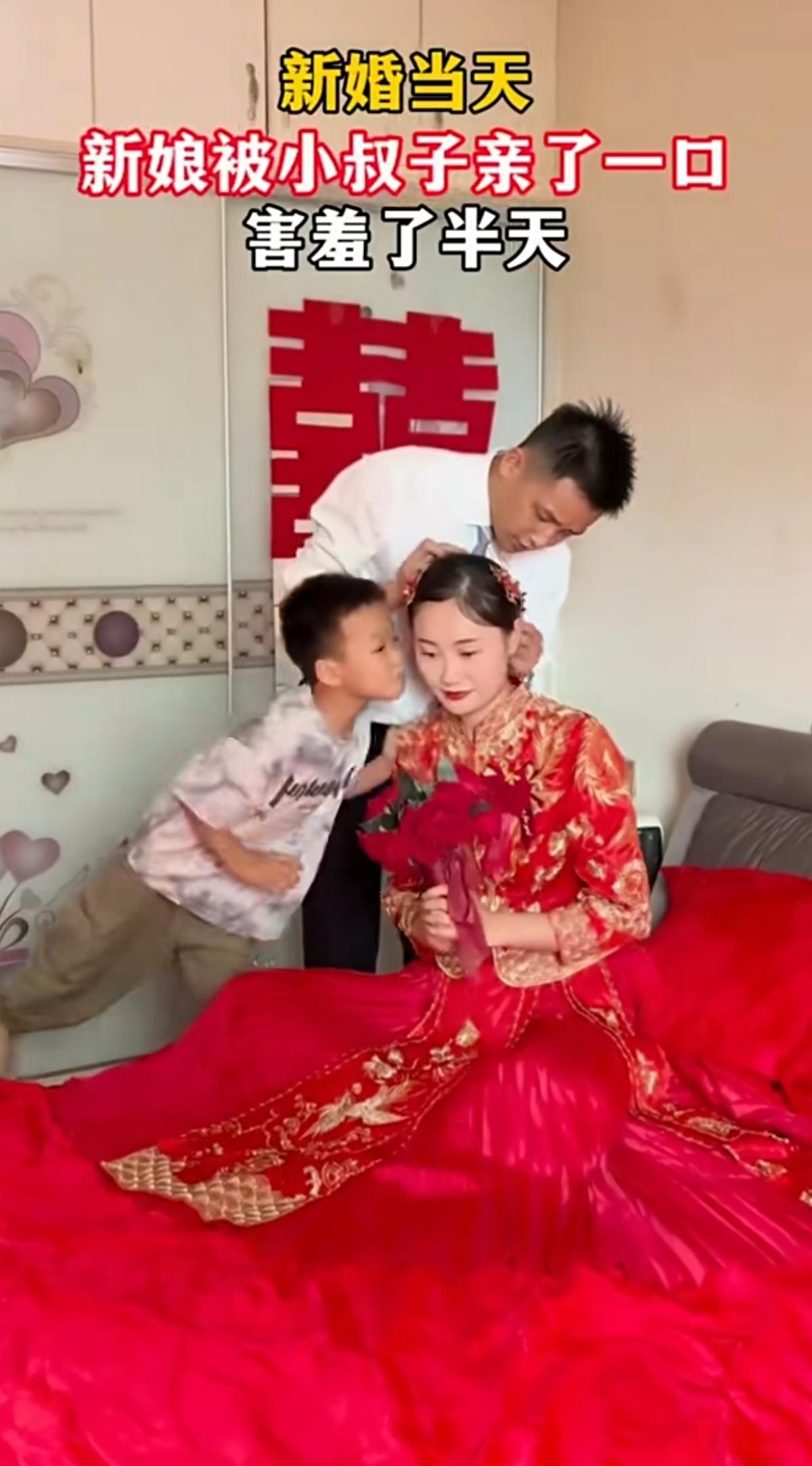 新婚当天小叔子偷亲新娘，玩笑闹婚的边界，不该被喜庆冲淡
 
婚房大红喜字满目喜庆