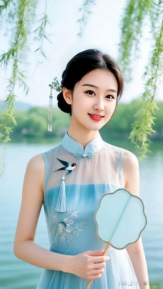 时尚穿搭柳岸风轻，燕语呢喃，一袭青衣醉流年。
