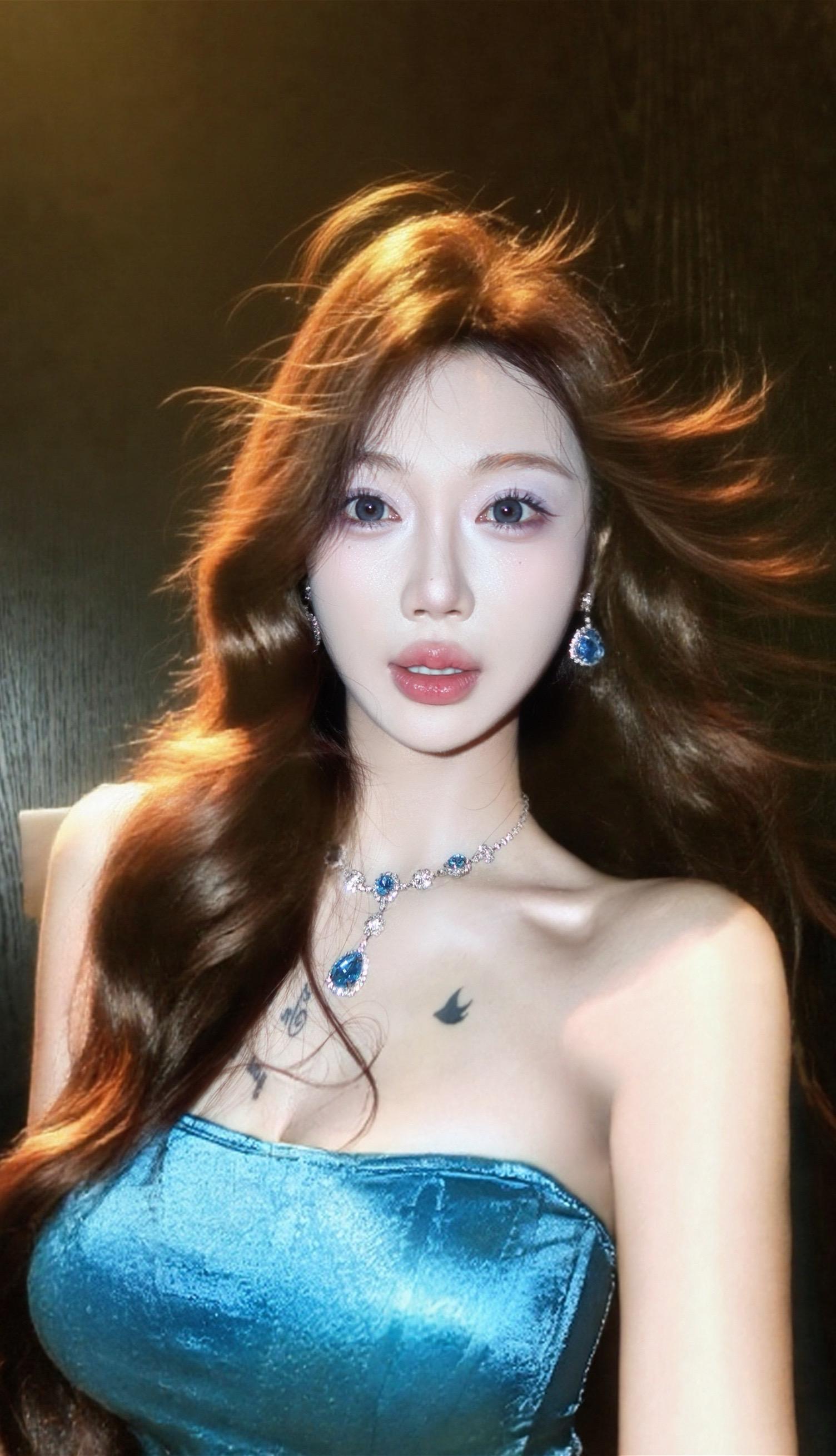 这世界总不会对漂亮女人太绝情