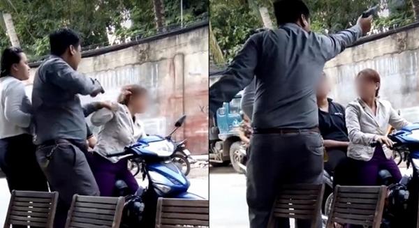 越南胡志明市新平县，一女子向公司讨要工资，保安朝天开枪恐吓。
保安使用的枪是一把