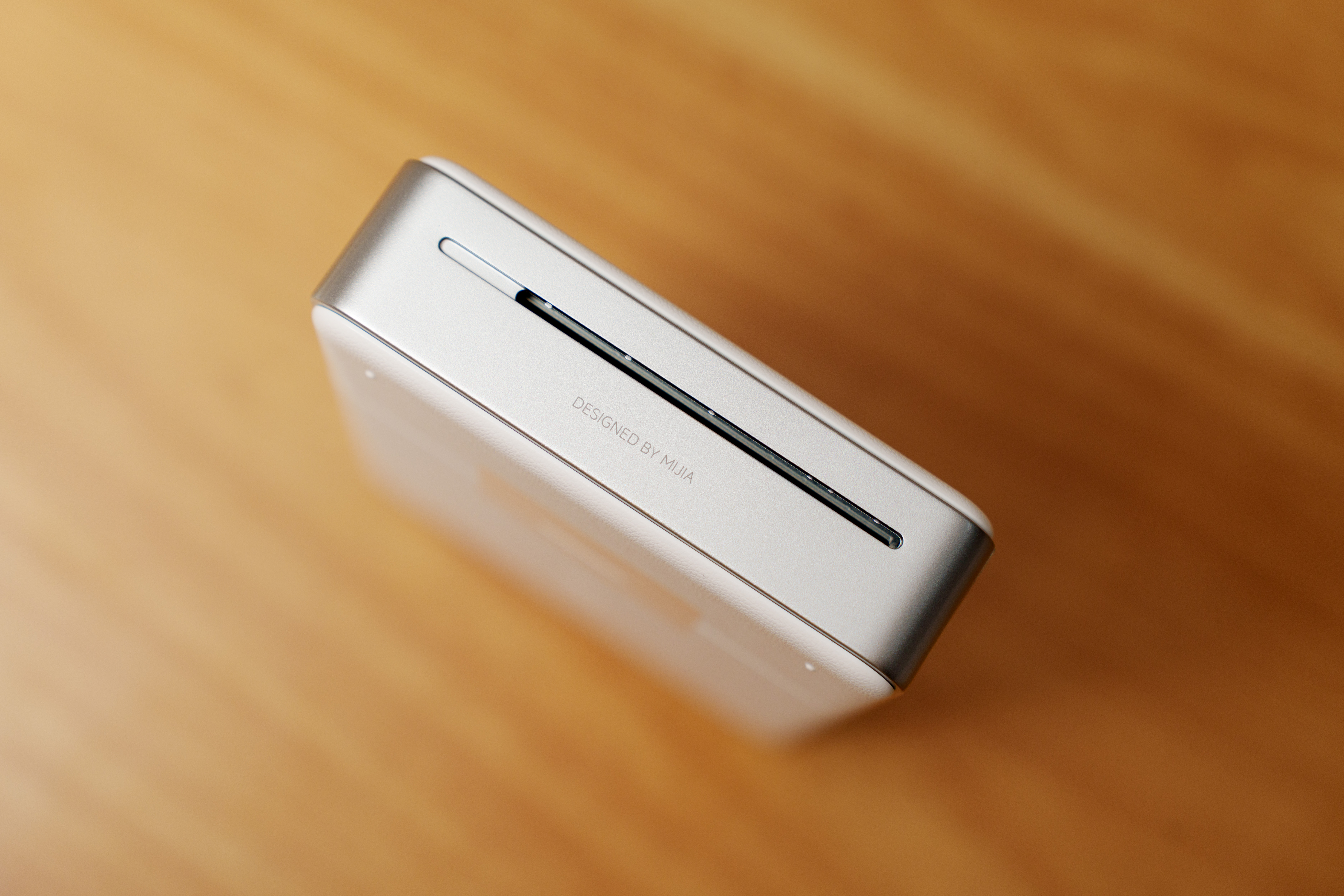 用 米家口袋照片打印机Pro纪念礼盒 打印了2025年我和汪总的几张照片，送给汪