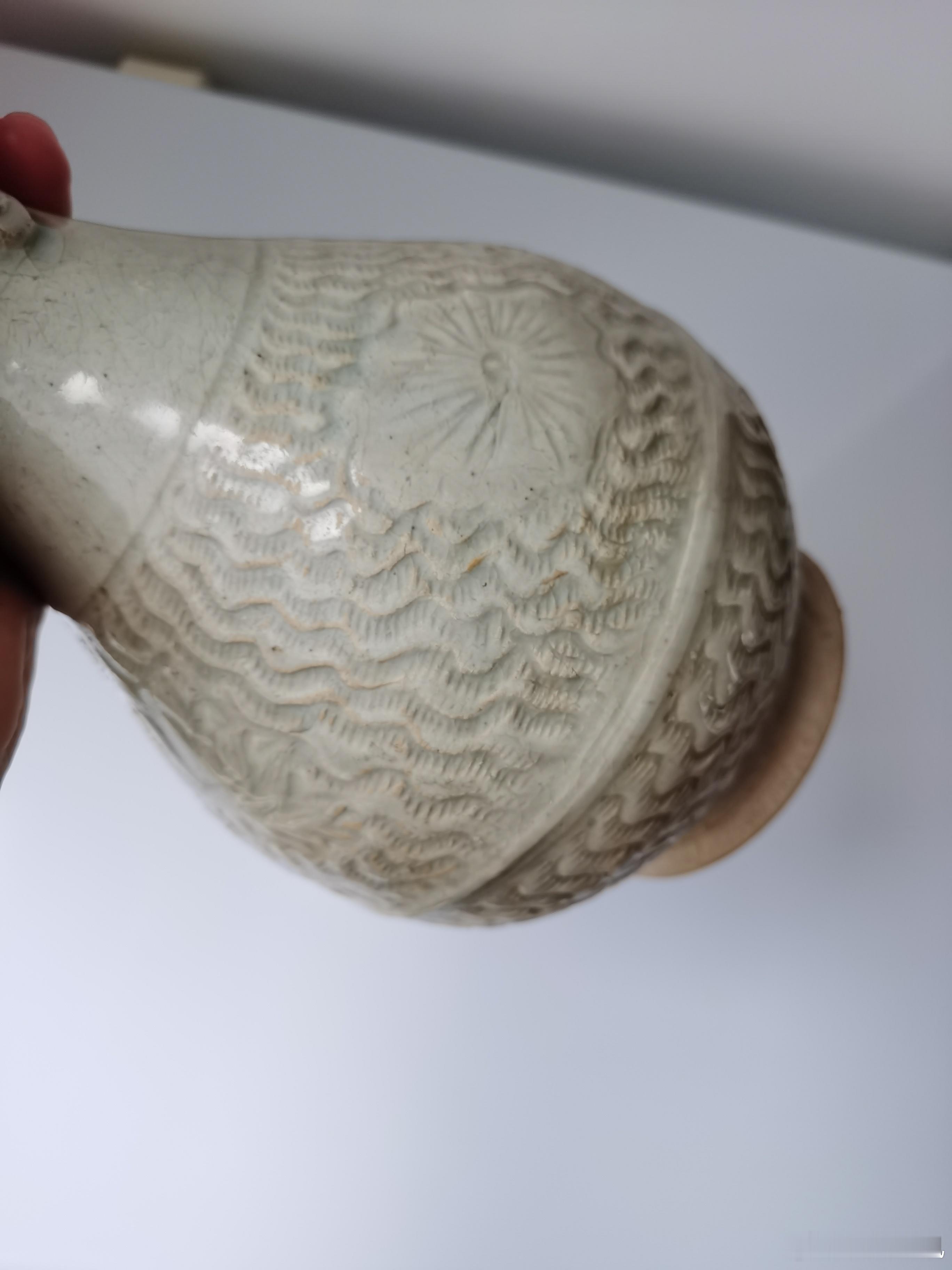 古瓷鉴定 宋 云市窑曲水荷花瓶，高26cm左右，这个图案源于蜀锦的紫曲水，又称落