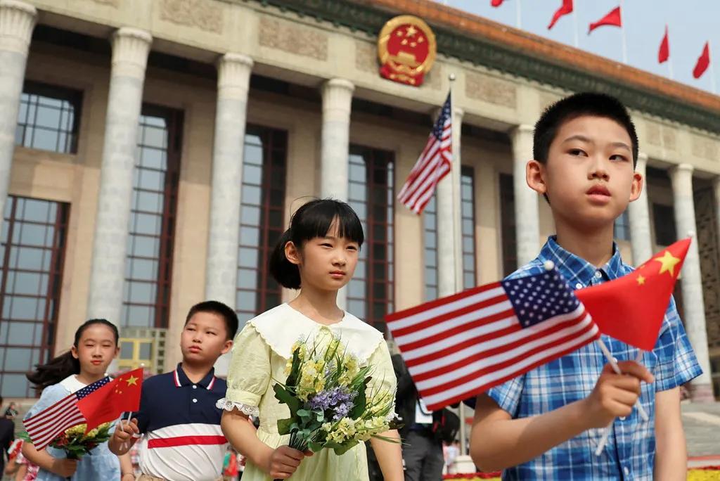 被路透社记者用镜头记录下的中国青少年应该是这场外交盛宴的功臣。