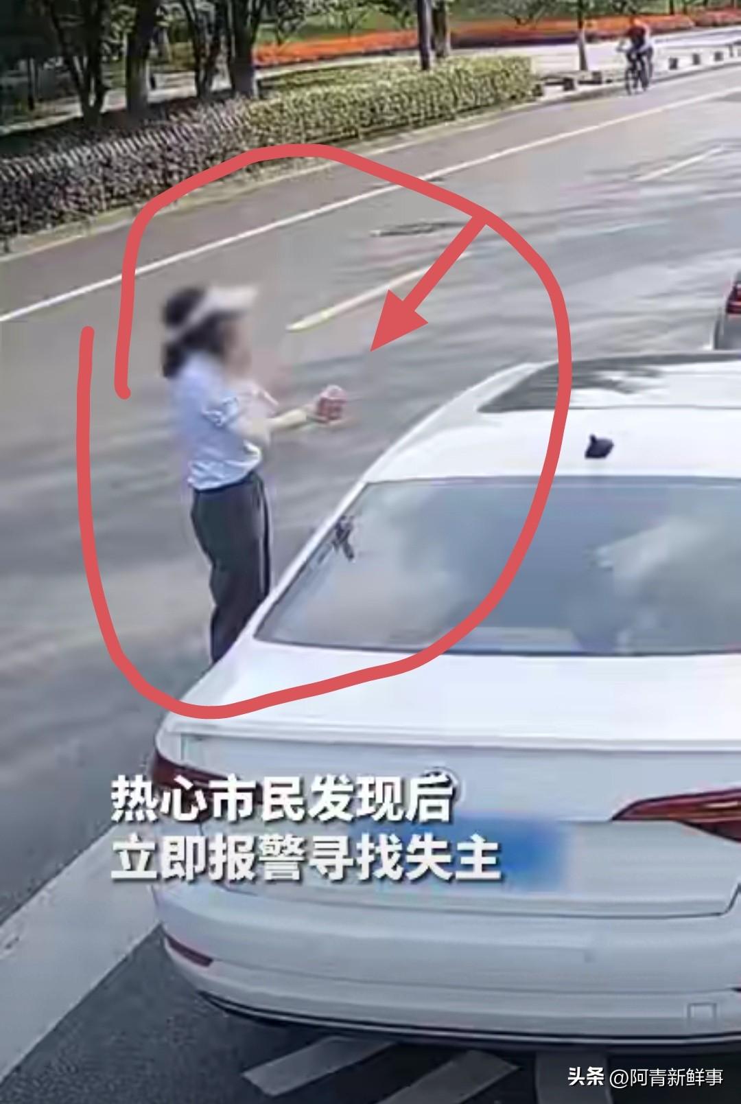 浙江，一个女子停好车准备离开，余光扫到后方车底有什么东西在飘。走近一看，没想到地