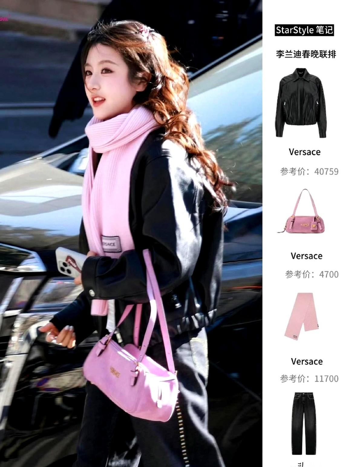 我天，这姐们儿是把一颗巨大的草莓大福穿身上了吧？
粉嘟嘟，软乎乎，配上那条黑裤子