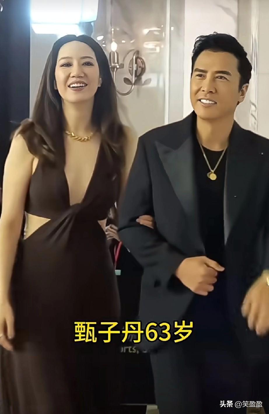 63岁的甄子丹和老婆出席活动，依然年轻帅气，不愧是国际功夫巨星。真功夫子真棒[赞