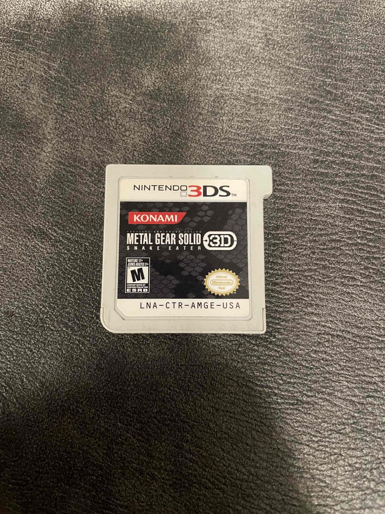 今天在广州鬼市花了5块钱，淘到了这张3DS的《合金装备》卡带。

外壳有点旧，上